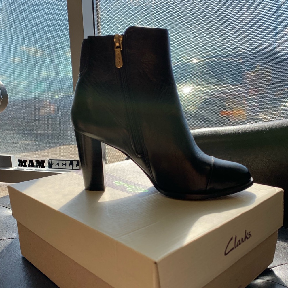 Black leather women’s ankle boot with zipper